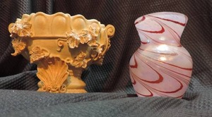 lot 225 image: beige vases and red swirled vase