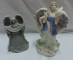 lot 260 image: 2 angel lot one holding a dove the other with a small prayer