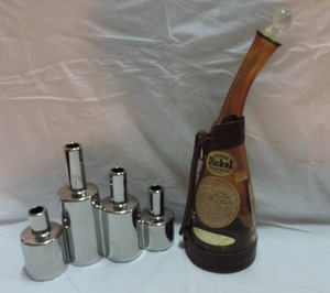 lot 272 image: siler colored bottle decor with a  odd shaped decanter