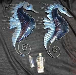 lot 281 image: seahorse decor wit a small jar with shark teeth in it and a small jar of sand and shells