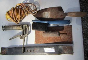 lot 36 image: extension light- TROWEL, grease gun- lawn mower blade