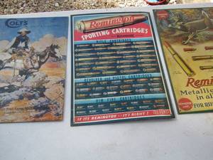 lot 51 image: 3 metal wall signs - COLT, REMINGTON X 2