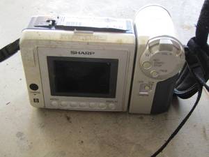 lot 58 image: sharp camcorder used in case with batterycharger
