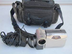 lot 90 image: sharp camcorder used in case with batterycharger