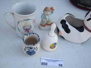 lot 98 image: cow vase- bell- coffee cup- plus