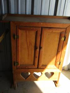 lot 103 image: wooden cabinet w doors &  2 shelves needs wiped down