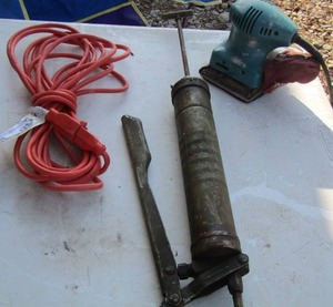 lot 134 image: extension cord- grease gun-Makita sander