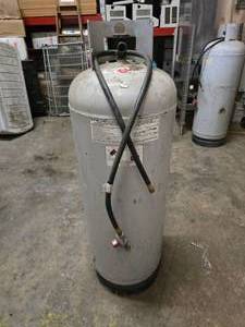 lot 29 image: 60LB Propane Tank w Hose.  Tank Appears To Still Have Propane In It.