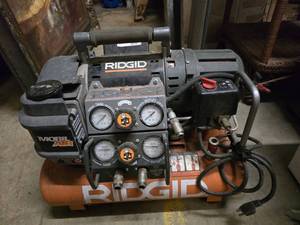 lot 106 image: Ridgid Mobil Air OF5015OTS Tri-Stack 5-Gallon Air Compressor.  Sounds Like it Needs A New Capacitor.