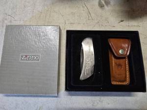 lot 189 image: Vintage Zippo Camel Cigarettes Pocket Knife w Leather Sheath
