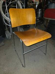 lot 243 image: NEW Lot of 50 Chrome & Medium Oak Stacking Chairs w Steel Chair Storage Rack.  Chrome Frame w Wood Seat & Back.