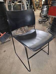 lot 244 image: NEW Lot of 50 Black Metal Stacking Chairs w Steel Chair Storage Rack.  Black Steel Frame w Metal Back & Seat