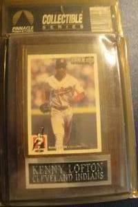 lot 23 image: Removable, Cleveland Indians Kenny Lofton Collectors Card in Plastic Sleeve Mounted on Wall Plaque, Sealed in Package