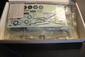 lot 32 image: Collectible 148 Scale, P-510 Mustang, Plastic Model Plane Kit. Sealed in Plastic, Storage Box