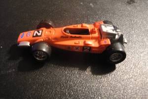 lot 45 image: 4-1996 Playing Mantis Die Cast Indy Race Cars, 1-1970  Al Unser #2 Johnny Lightning, 1-1975 Bobby Unser #48 Jorgensen Eagle, 4 X Money