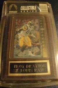 lot 53 image: Removable St. Louis Rams Troy Drayton Collector Card in Plastic Sleeve Mounted on Wall Plaque Sealed on Package