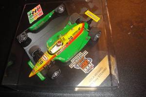 lot 71 image: Collectible Team Menard 1996 Indianapolis 500 Pole Position Tony Stewart #20 Die Cast Car in Plastic Display Case.