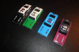 lot 75 image: 4-1992 Racing Champions, 69 Mercury Cyclone Die Cast Race Cars, 1-Elmo Langley # 64, 1-Tiny Lind #16, 1-JD McDuffie #70, 1-Tiny Lind #55 4 X Money
