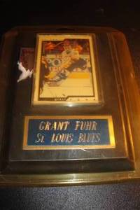 lot 83 image: Removable St. Louis Blues Grant Fuhr Collector Card in Plastic Sleeve Mounted on Wall Plaque.