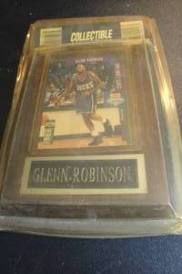 lot 103 image: Removable Milwaukee Bucks, Glenn Robinson, 1994 Draft Class, Collectors Card in Plastic Sleeve Mounted on Wall Plaque.