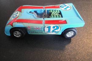 lot 111 image: 1-Porsche-90803 By Mercury #12 Die Cast Race Car, Made in Italy.