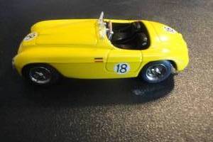 lot 121 image: 1- 143 Scale Art Model Ferrari Story #18 Die Cast Race Car