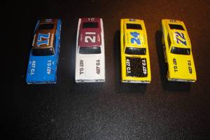lot 124 image: 4-1992 Racing Champions 69 Mercury Cyclone Die Cast Race Cars, 1-#17 David Pearson, 1-#21 AJ Foyt, 1-#24 Cecil Gordon, 1-#72 Benny Parsons, 4 X Money