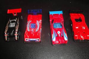 lot 158 image: 4- Collectible Die Cast Hot Wheels Racing Cars, 1-1999 Shadow Mk 11a, 1-1997 Panoz GTR-1, 1-2000 #74 Riley Scott, 1-2000 Panoz Roadster LMP-1, 4 X Money