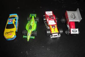 lot 173 image: 4-Collectible Die Cast Race Cars, Mixed Styles and Brands,  4 X Money