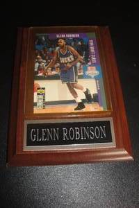 lot 183 image: Upper Deck Collectors Choice, Removable Milwaukee Bucks Glenn Robinson, 1994 Draft Class Collector Card in Plastic Sleeve Mounted on Wall Plaque, NOT in Original Package