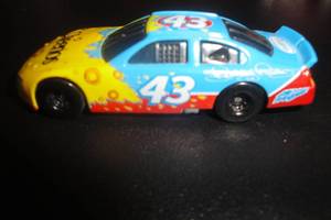 lot 184 image: 5-Collectible Die Cast Race Cars, Mixed Styles and Brands and 1 Die Cast Battery Pack Trailer  5 X Money