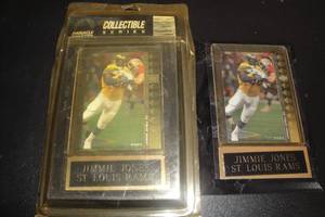 lot 199 image: Lot of 2 Removable, St. Louis Rams, Jimmie Jones Collector Card in Plastic Sleeve Mounted on Wall Plaque. 1- Sealed in Package, 1- No Package, Needs Name Plate Straightened