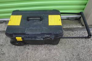 lot 106 image: Stanley Essential Chest, About 66x40x34, 13 Gal., Retractable Handle, Plastic Wheels, Top Carrying Handle, 2 Top Parts Bins, I Fliplock Needs Replaced.