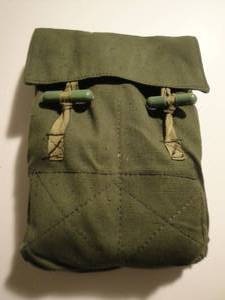 lot 218 image: 20-Vintage 4-Cell Military Mag Pouch With Wooden Toggle Closures. Note  X-Money