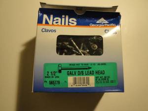 lot 226 image: 20- 5-Lb. Boxes Of Galv. DS Lead Head, 2-12 Long Nails, Note X-Money