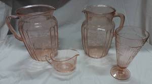 lot 21 image: mixed lot pink glass some different shades 2 pitchers a glass and a gravy glass