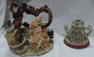 lot 38 image: home Decore boy kissing girl under tree figure  teapot decor  with bears