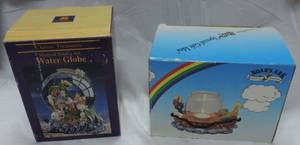 lot 42 image: Noahs Ark globe and candle holder