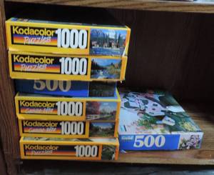 lot 44 image: mixed lot of puzzles one new the others open