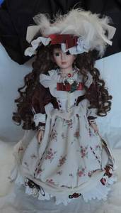 lot 83 image: Porcelain doll approximately 16 inches tall