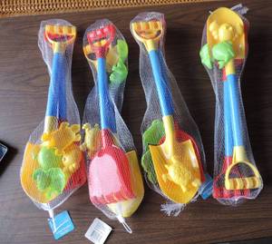 lot 262 image: Long long handle tool set for kids shovel rake and sand toys
