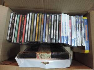 lot 312 image: Lot of CDs and CD holder with zipper holds 40 CDs