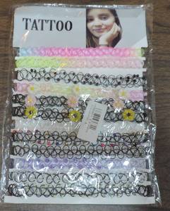 lot 322 image: Tattoo braceletschokers