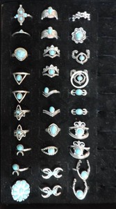 lot 323 image: All rings in picture display case not included