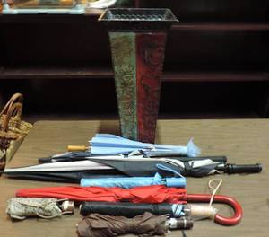 lot 366 image: Umbrellas and metal vase