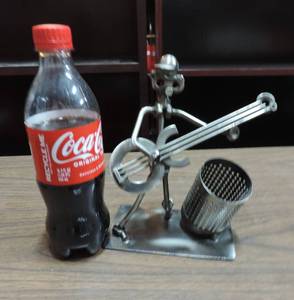 lot 380 image: Nuts & Bolts Metal Bass Guitar Player Sculpture Folk Art Welded with Pen Holder