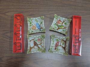 lot 394 image: 4 glass bowls with pictures of birdssix chicken napkin rings