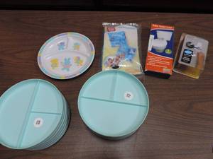 lot 404 image: Kids lot 13 plates  arm floaties  baby toilet lock and baby door lock