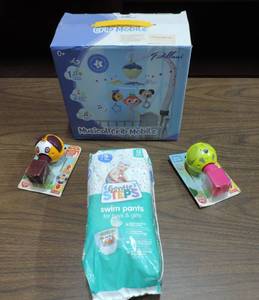 lot 425 image: Crib mobile  to block toys and a pack of swimmers