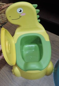 lot 455 image: Dinosaur potty chair
